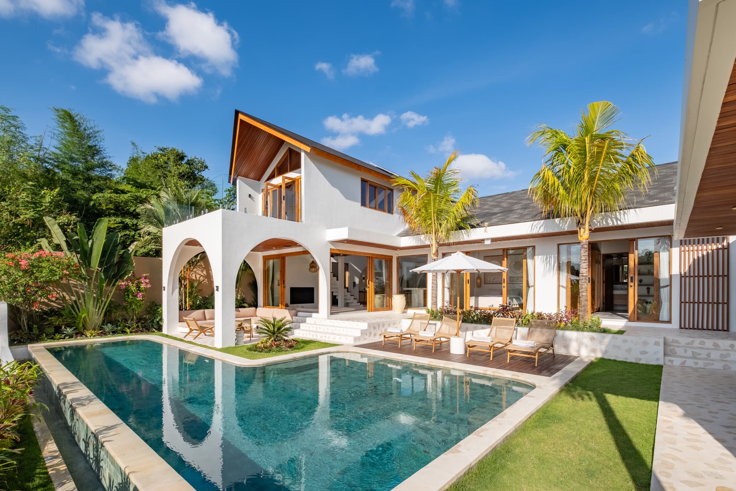 Villa Vayu viewed from the pool with surrounding jungle